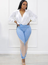 Pantalones largos de mezclilla sintética con parches de malla